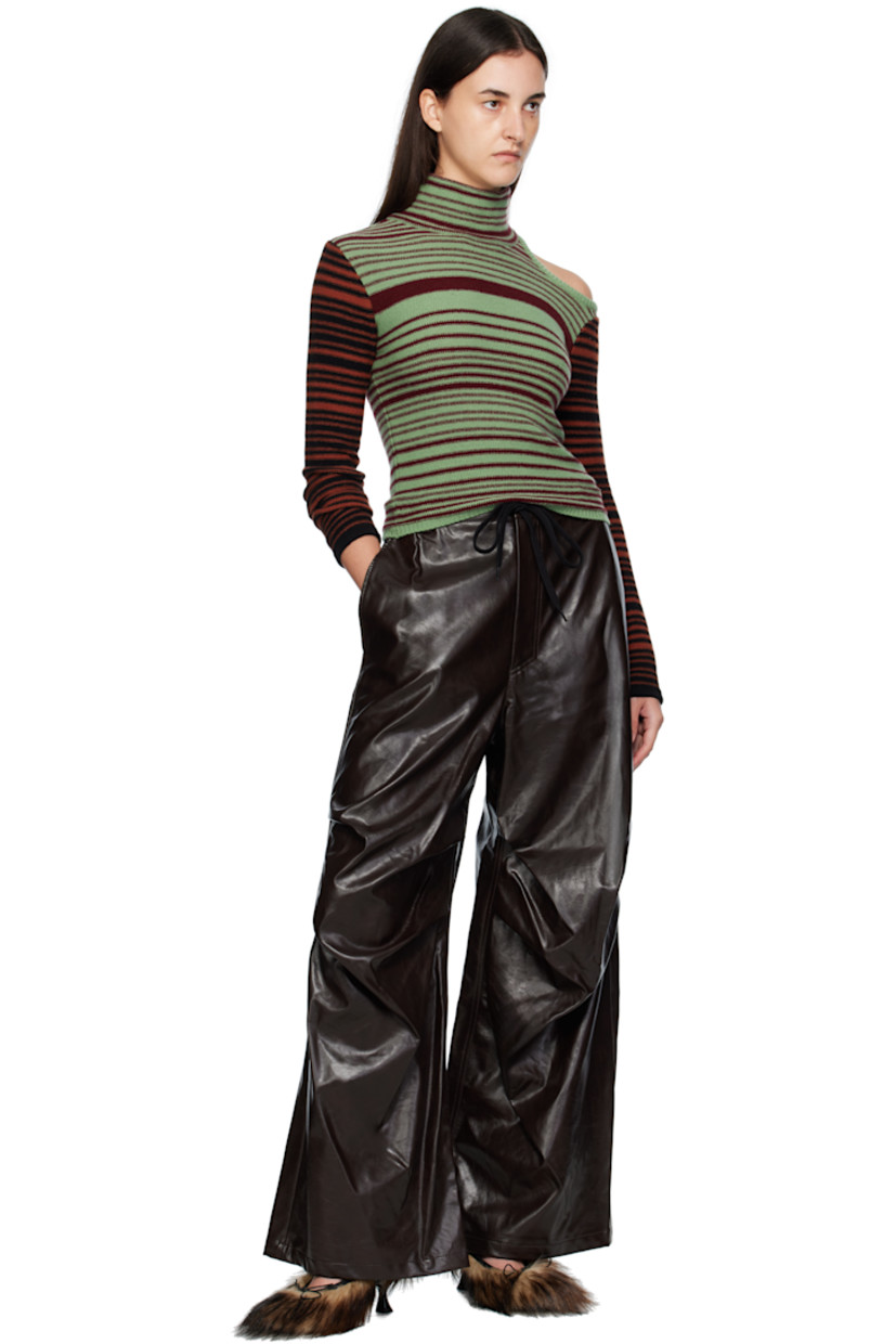 Knit wool-blend turtleneck.

· Stripes throughout
· Rib-knit hem
· Cutout at shoulder
· Logo plaque at back collar

Supplier color: Green