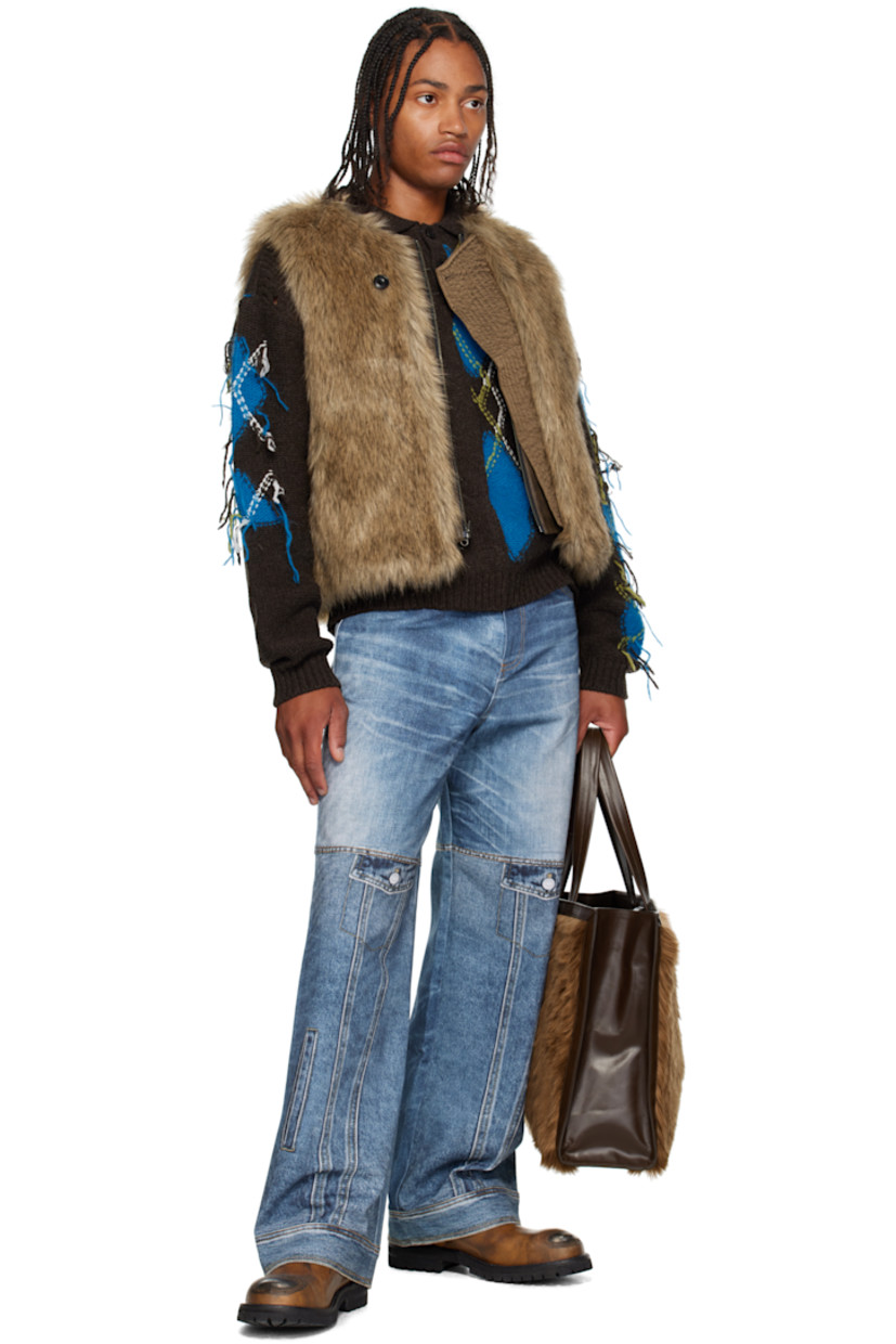 Faux-fur and buffed faux-leather tote.

· Leather shoulder straps
·� Press-stud tab fastening at throat
· Detachable pouch with press-stud fastening at interior
· Pouch features four card slots and one note slot
· Alternate press-stud fastening at face
· Patch pocket at interior
· Twill lining
· H14" x W18" x D6"

Supplier color: Brown