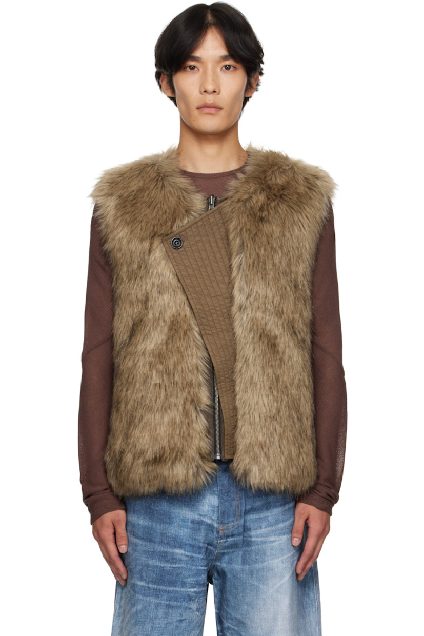Reversible padded faux-fur vest. 

Reverse in brown grained faux-leather. Smudging throughout.

· Crewneck
· Quilted nylon twill panel at offset zip closure
· Welt pockets at waist and interior 

Supplier color: Brown