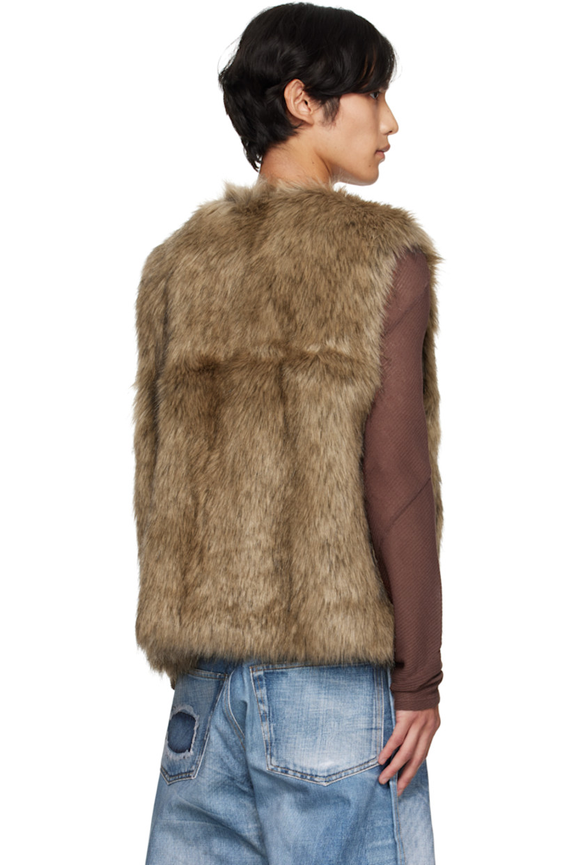 Reversible padded faux-fur vest. 

Reverse in brown grained faux-leather. Smudging throughout.

· Crewneck
· Quilted nylon twill panel at offset zip closure
· Welt pockets at waist and interior 

Supplier color: Brown
