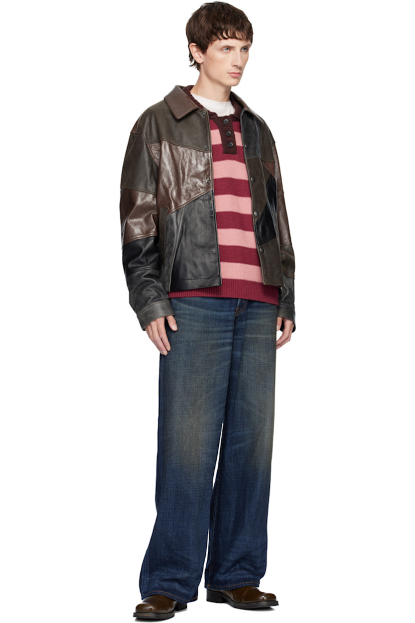 Grained leather jacket. 

· Patchwork construction 
· Smudging throughout 
· Spread collar 
· Press-stud closure
· Welt pockets at front 
· Pleats at buttoned barrel cuffs
· Logo discs at back collar 
· Welt and patch pocket at interior 
· Full satin twill lining 

Supplier color:  Mud black/Brown