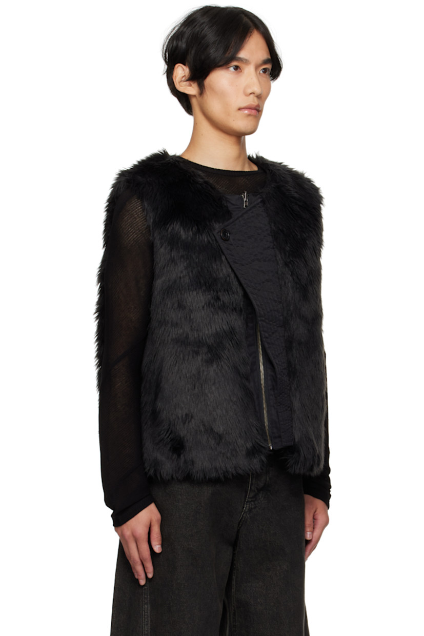 Reversible faux-fur vest.

Reverse in black nylon taffeta.

· Round neck
· Asymmetrical placket at zip closure
· Welt pockets at front
· Welt pockets at interior

Supplier color: Black