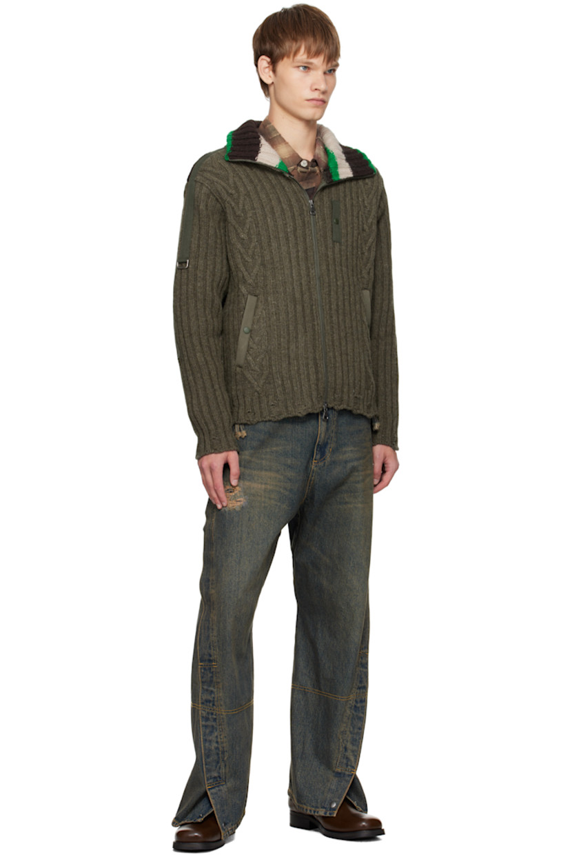 Non-stretch denim jeans.

· Fading, whiskering, and distressing throughout
· Belt loops
· Four-pocket styling
· Zip fly
· Press-stud vent at cuffs
· Twisted outseams
· Logo patch at back waistband
· Contrast stitching in tan

Supplier color: Dusty blue