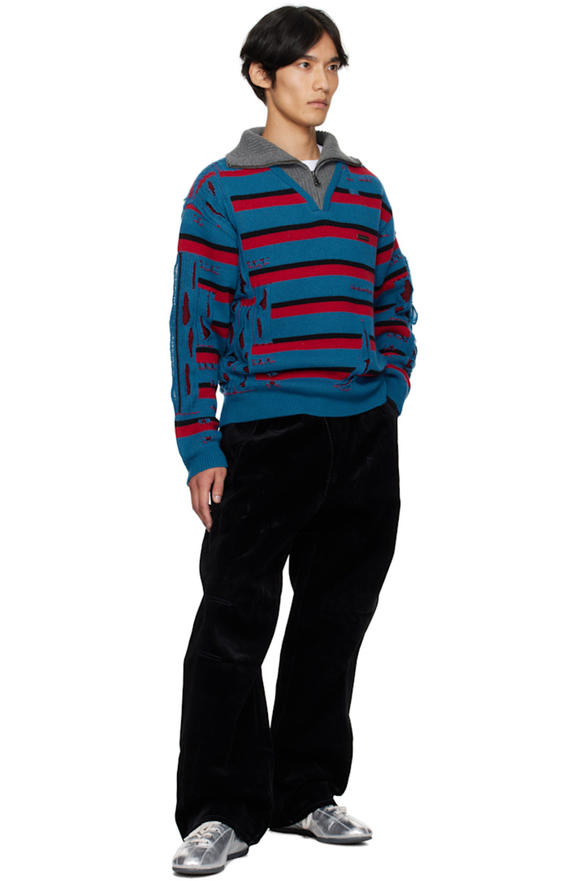 Heavyweight cotton corduroy trousers.

· Belt loops at asymmetrical waistband
· Five-pocket styling
· Modified button fly
· Darts at knees
· Cinch tabs at back waistband
· Webbing loops at waistband

Supplier color: Black