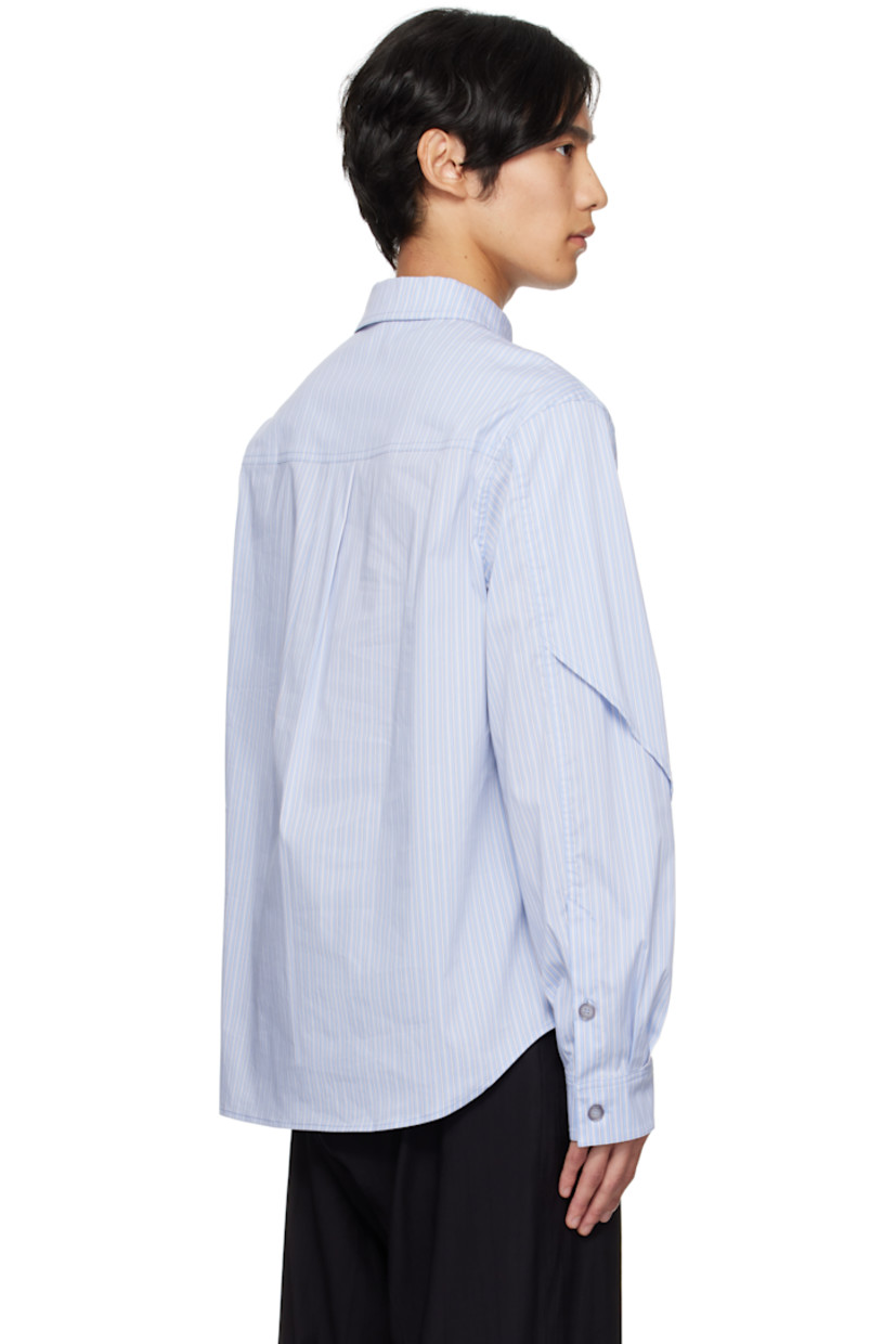 Stretch cotton-blend poplin shirt.

· Asymmetrical construction
· Stripes throughout
· Spread collar
· Overlay with button fastenings at front
· Button closure
· Shirttail hem
· Buttoned barrel cuffs
· Box pleat at back yoke

Supplier color: Blue