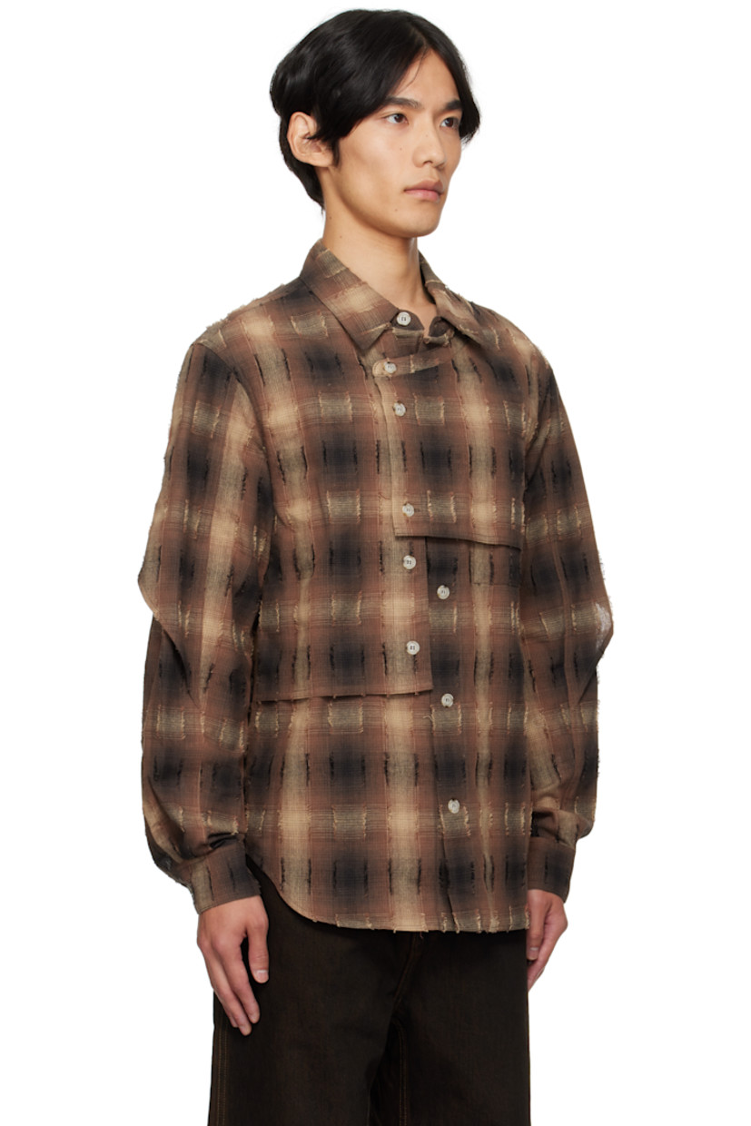 Plain-woven cotton-blend shirt.

· Check and fil-coupé pattern throughout
· Spread collar
· Overlay with button fastenings at front
· Button closure
· Shirttail hem
· Buttoned barrel cuffs
· Box pleat at back yoke

Supplier color: Brown