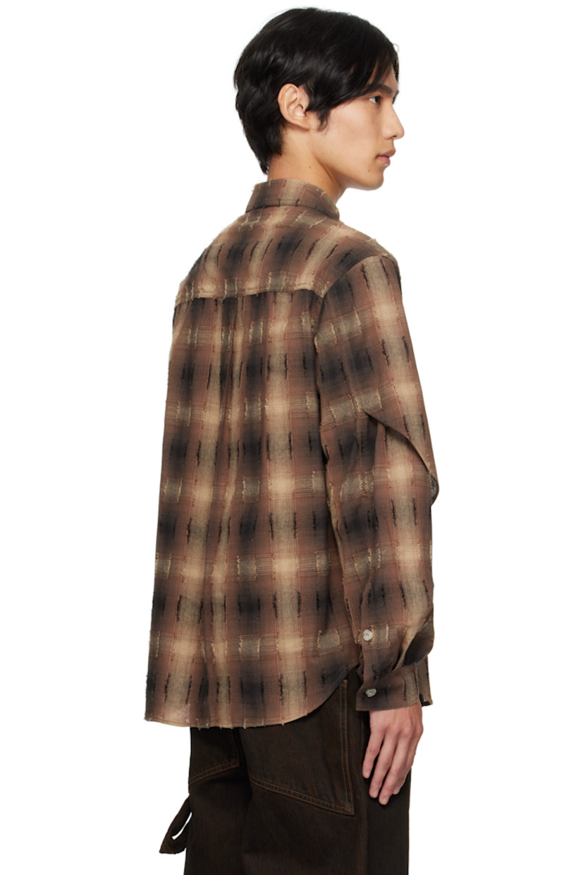 Plain-woven cotton-blend shirt.

· Check and fil-coupé pattern throughout
· Spread collar
· Overlay with button fastenings at front
· Button closure
· Shirttail hem
· Buttoned barrel cuffs
· Box pleat at back yoke

Supplier color: Brown