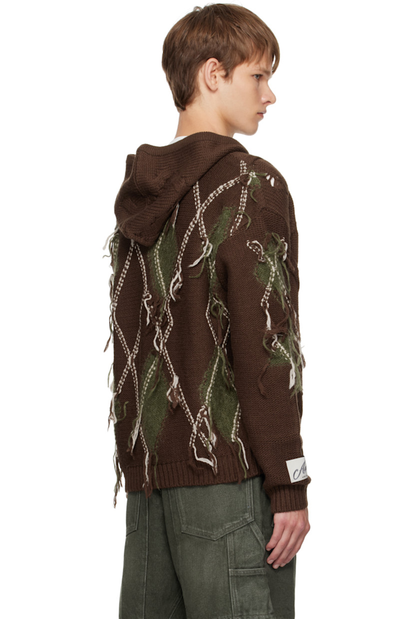 Cable-knit wool-blend hoodie.

· Fil-coupé argyle pattern throughout
· Rib-knit trim at hood, hem, and cuffs
· Two-way zip closure
· Welt pockets at front
· Logo patch at cuff

Supplier color: Brown