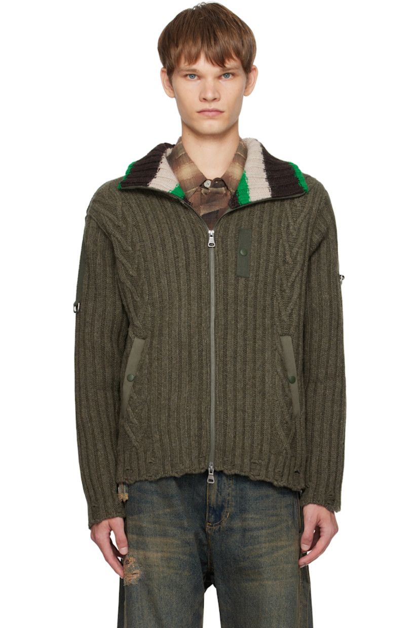 Rib-knit wool-blend sweater.

· Distressing throughout
· Stripes at stand collar and back
· Two-way zip closure
· Webbing trim at chest and sleeves
· D-ring at sleeves
· Twill elbow patches

Supplier color: Khaki
