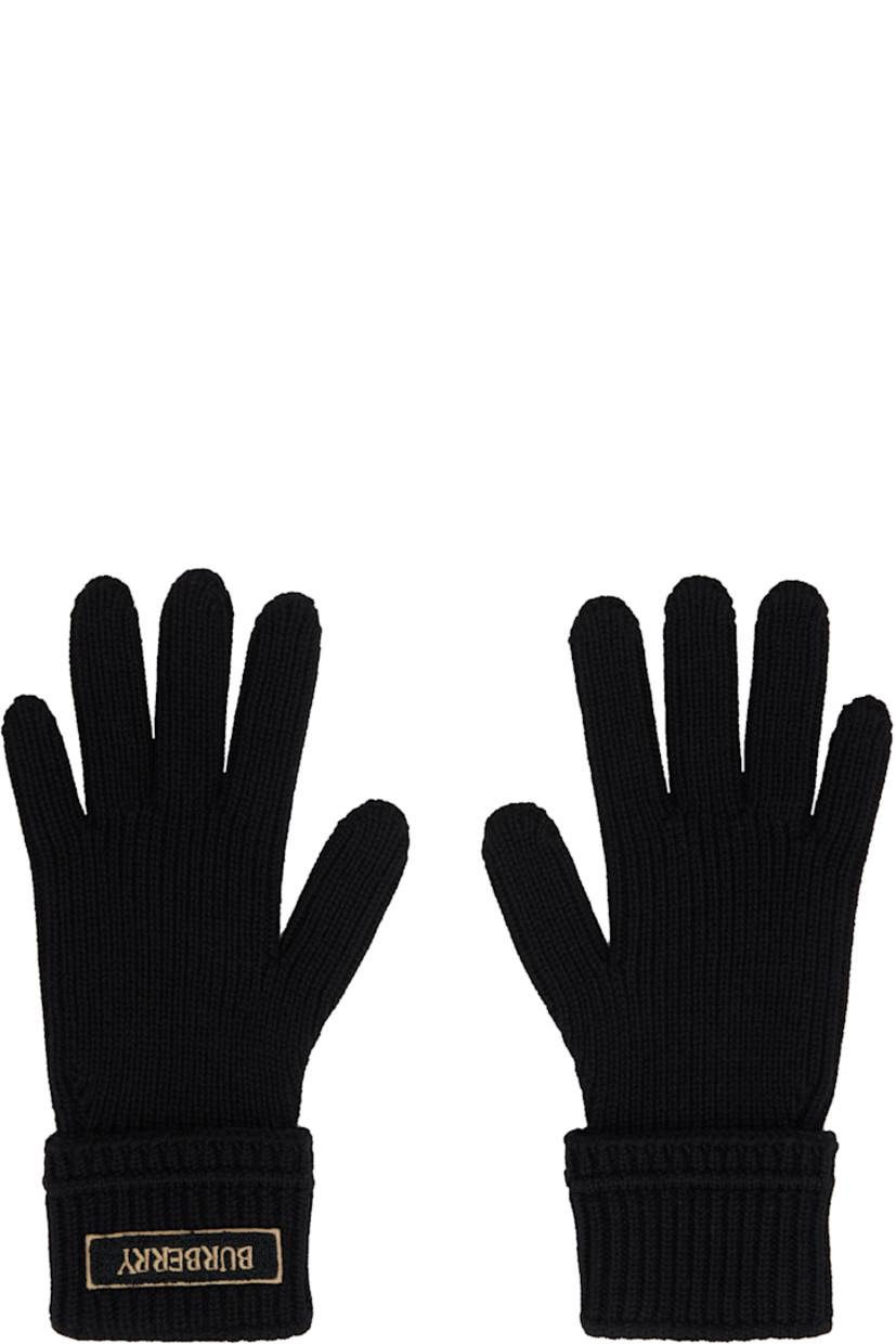 Pair of knit wool-blend gloves. 

· Bouclé logo patch at top
· Rib-knit cuffs

Supplier color: Black