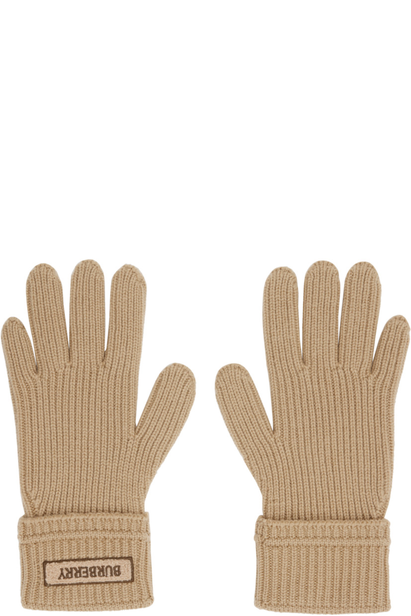 Pair of knit wool-blend gloves. 

· Bouclé logo patch at top
· Rib-knit cuffs

Supplier color: Sand