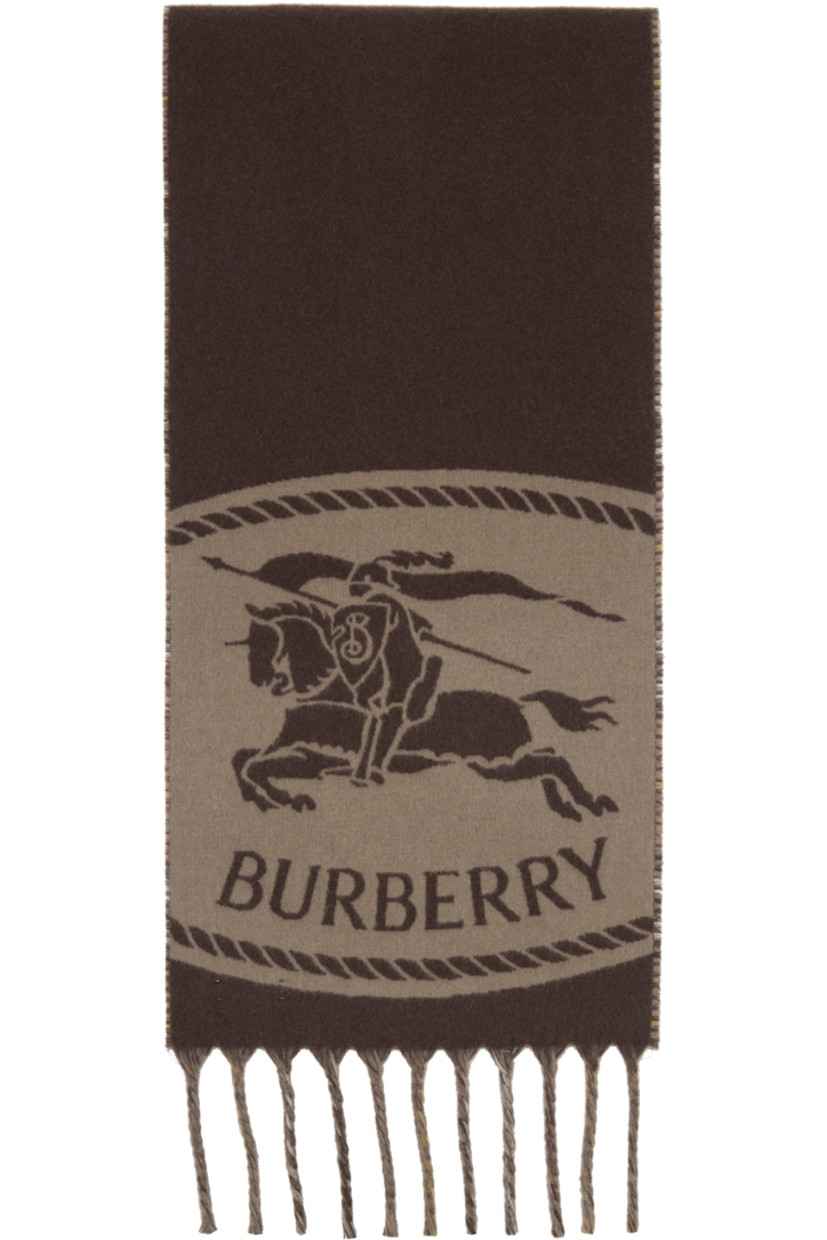 Rectangular cashmere flannel scarf.

· Jacquard logo graphic at face
· Fringed detailing at ends
· Check pattern at back face
· L66" x W11"

Supplier color: Vole