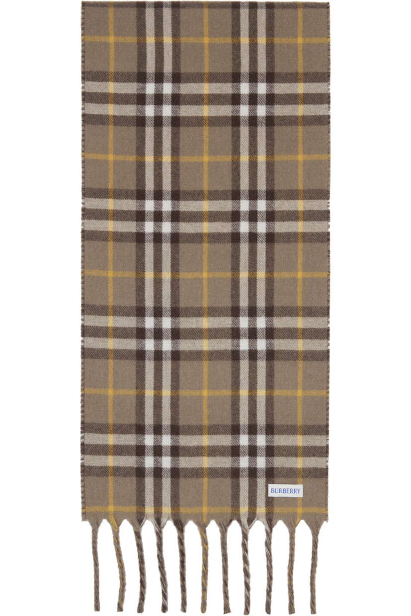 Rectangular cashmere flannel scarf.

· Jacquard logo graphic at face
· Fringed detailing at ends
· Check pattern at back face
· L66" x W11"

Supplier color: Vole