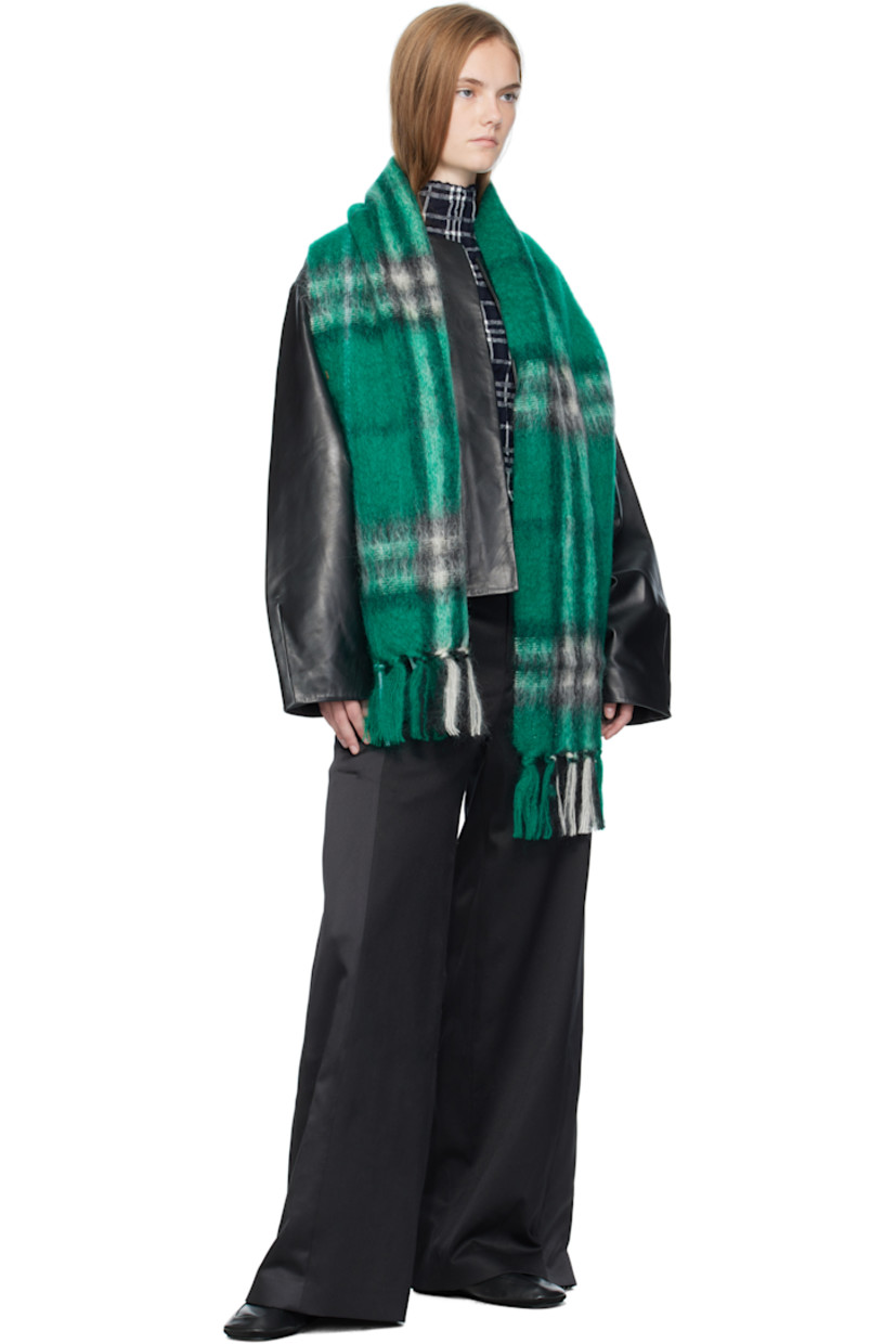 Rectangular brushed mohair- and wool-blend flannel scarf.

· Check pattern throughout
· Fringed detailing at ends
· L66" x W11.75"

Supplier color: Leaf