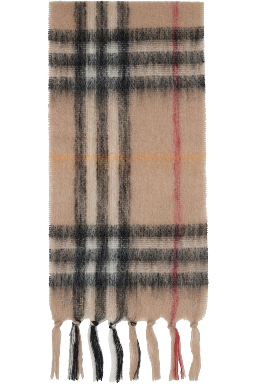 Rectangular brushed mohair- and wool-blend flannel scarf.

· Check pattern throughout
· Fringed detailing at ends
· L66" x W11.75"

Supplier color: Sand