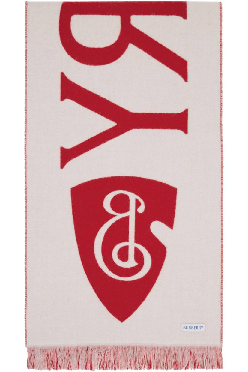 Rectangular wool flannel scarf.

· Jacquard logo at length
· Logo patch at back face
· Fringed detailing at ends
· L66" x W13"

Supplier color: Post
