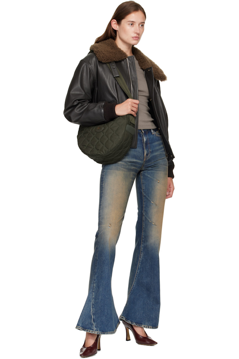 Quilted technical nylon satin messenger bag.

· Adjustable crossbody strap
· Leather logo patch at face
· Rib-knit patch pocket at sides
· Magnetic compartment at back face
· Zip closure
· Check-patterned lining
· H8" x W13" x D4"

Supplier color: Shale