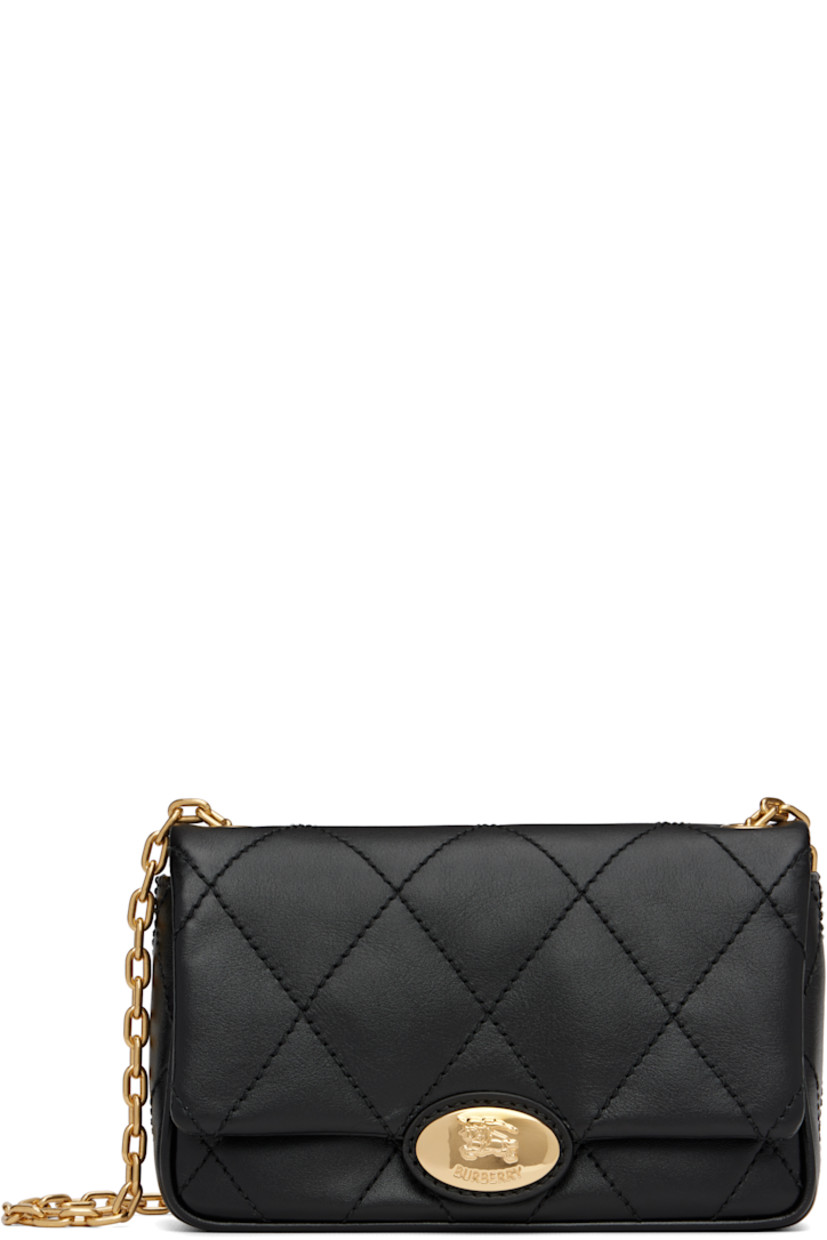Quilted grained calfskin shoulder bag.

· Cable chain crossbody strap
· Flap with logo-embossed magnetic closure
· Four card slots at interior
· Twill lining
· H5" x W7.5" x D2.75"

Supplier color: Black