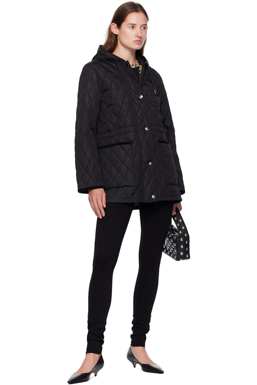 Insulated and quilted nylon satin coat. 

· Water-repellent
· Cotton corduroy trim throughout 
· Drawstring at hood
· Two-way zip closure and press-stud placket 
· Patch pockets at front 
· Cord-lock drawstring at interior waist 
· Patch pocket at interior 
· Full twill lining

Supplier color: Black/Sand ip check