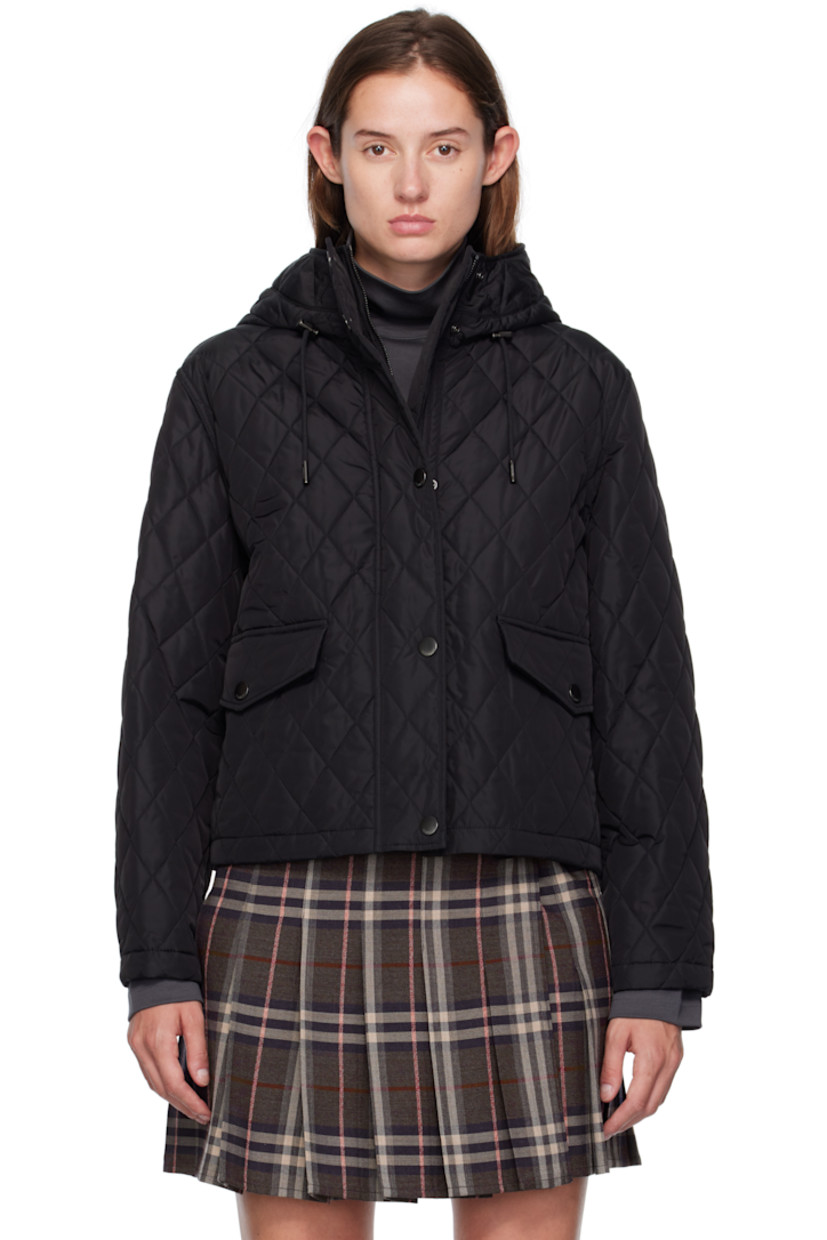 Insulated and quilted reused nylon satin jacket. 

· Cord-lock drawstring at hood
· Two-way zip closure and press-stud placket
· Flap pockets at waist
· Press-stud fastening at cuffs
· Patch pocket at interior 
· Check-patterned cotton twill lining 

Supplier color: Black