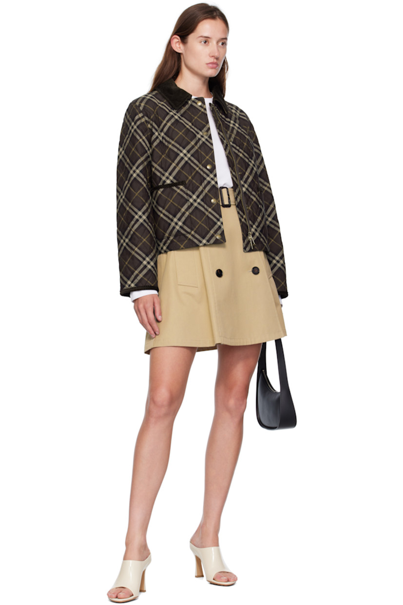 Insulated cotton canvas jacket.

· Check pattern throughout
· Corduroy trim throughout
· Spread collar
· Zip closure with press-stud placket
· Patch pockets at waist
· Cropped hem
· Logo flag at side seam
· Press-stud pocket at interior
· Quilted twill lining

Supplier color: Truffle IP check