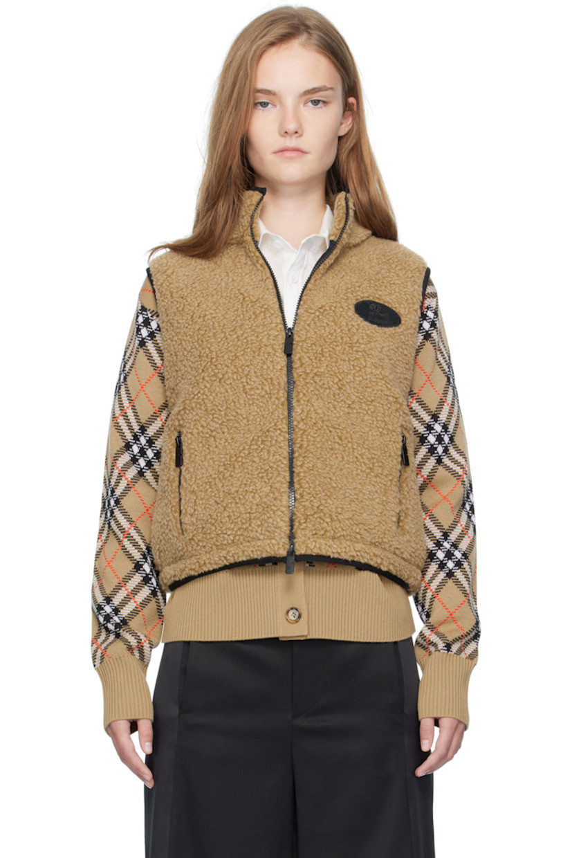 Wool-blend fleece vest.

· Stand collar
· Two-way zip closure 
· Bouclé logo patch at chest
· Zip pockets at front
· Bungee-style drawstring at cropped hem
· Full mesh lining

Supplier color: Shrew melange