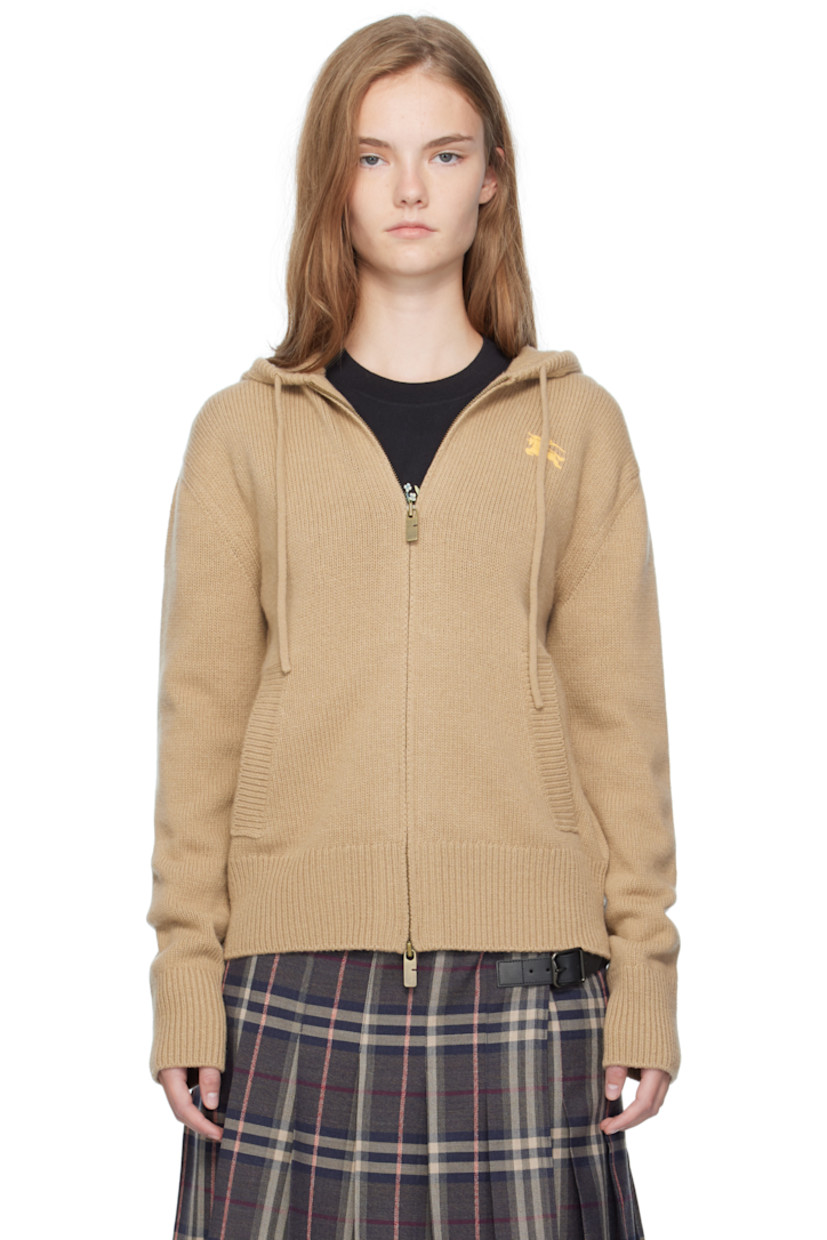 Knit wool- and cashmere-blend hoodie.

· Drawstring at hood
· Two-way zip closure
· Graphic embroidered at chest
· Welt pockets at front
· Rib-knit hem and cuffs
· Jacquard logo and graphic at back

Supplier color: Flax/Yolk