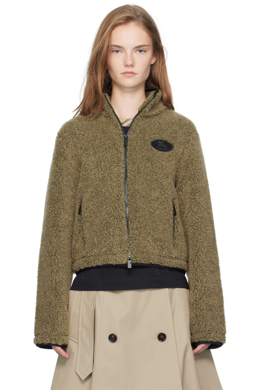 Wool-blend fleece jacket.

· Stand collar
· Two-way zip closure
· Bouclé logo patch at chest
· Zip pockets at front
· Bungee-style drawstring at elasticized hem 
· Elasticized cuffs
· Full mesh lining

Supplier color: Mire melange