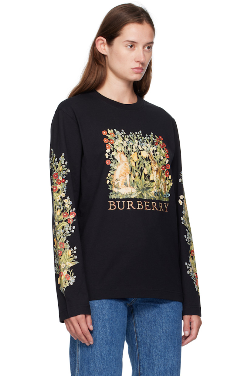 Cotton jersey T-shirt.

· Rib-knit crewneck
· Logo graphic printed at front
· Floral graphics printed at sleeves

Supplier color: Black