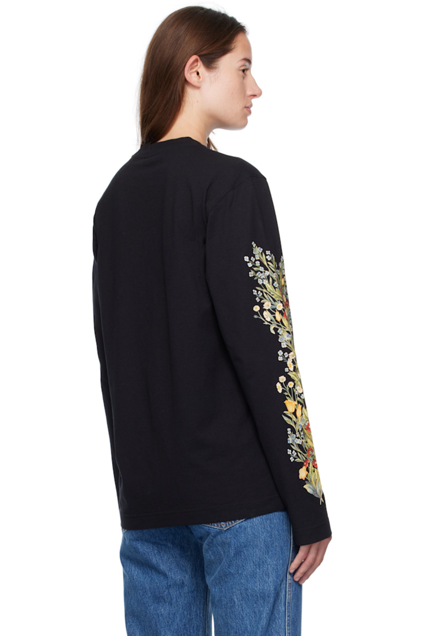 Cotton jersey T-shirt.

· Rib-knit crewneck
· Logo graphic printed at front
· Floral graphics printed at sleeves

Supplier color: Black