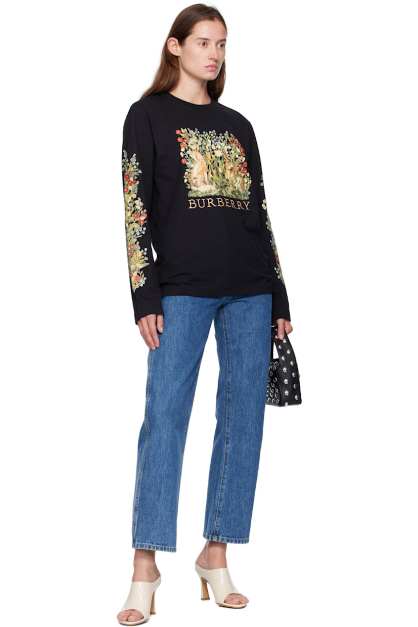 Cotton jersey T-shirt.

· Rib-knit crewneck
· Logo graphic printed at front
· Floral graphics printed at sleeves

Supplier color: Black