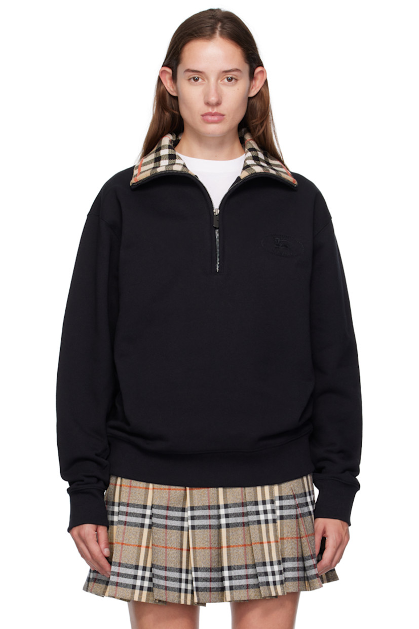 French terry polo.

· Rib-knit stand collar, hem, and cuffs
· Half-zip closure
· Logo embroidered at chest 
· Dropped shoulders
· Check pattern at inner collar

Supplier color: Black