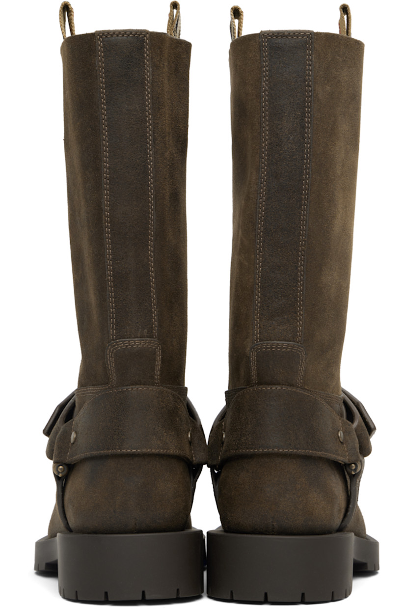 Calf-high calfskin suede boots. 

· Square toe 
· Pin-buckle strap at vamp
· Signature check pattern pull-loops at collar 
· Treaded rubber sole 

Supplier color: Loch