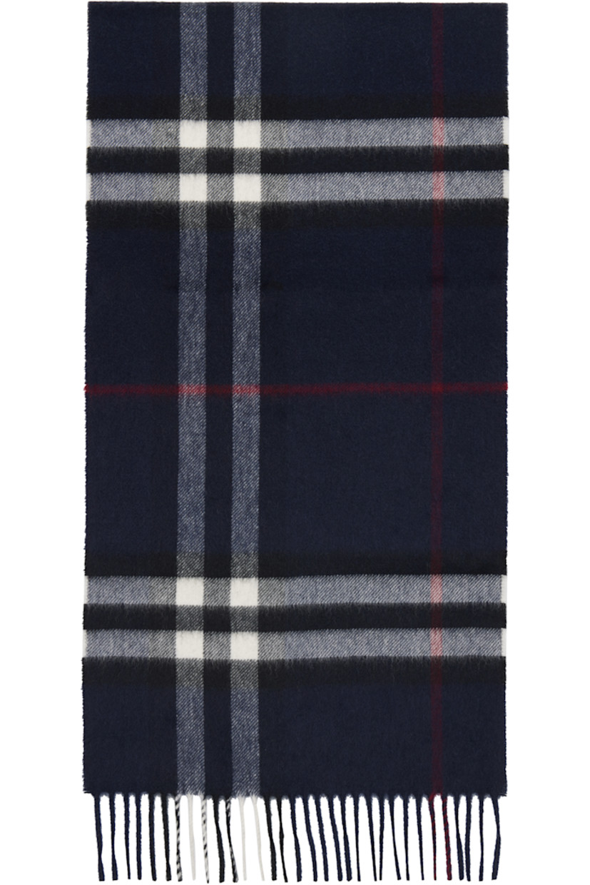 Rectangular brushed cashmere flannel scarf.

· Check pattern throughout
· Fringed ends 
· L72" x W12.75"

Supplier color: Ink blue