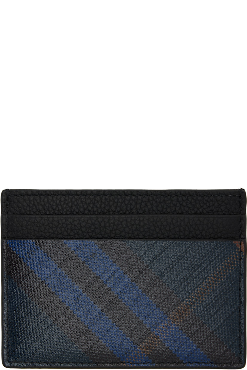 Pebble-grained calfskin and saffiano faux-leather card holder. 

· Signature check pattern throughout 
· Logo hardware at face
· Four card slots 
· Central note slot 
· Canvas lining 
· H3" x W4" 

Supplier color: Midnight