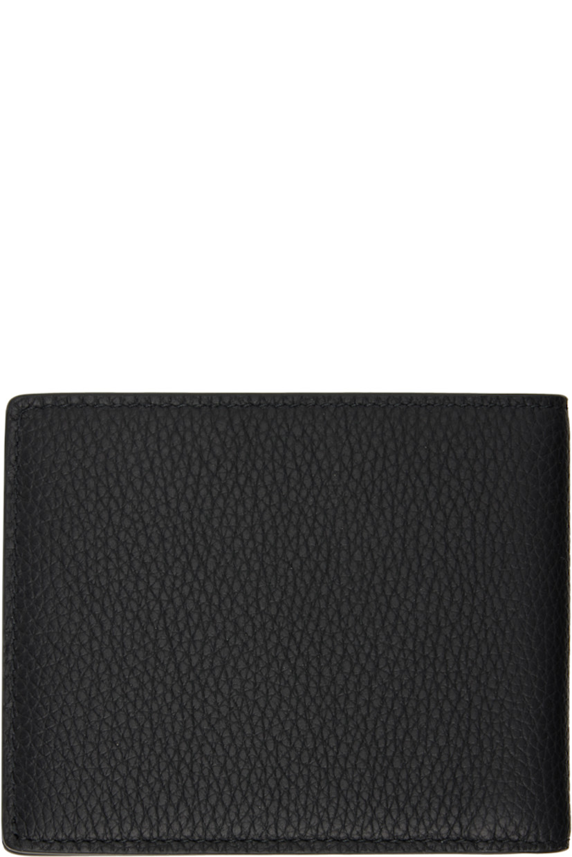 Pebble-grained calfskin bifold wallet. 

· Hand-painted edges 
· Logo hardware at face
· Six card slots at lambskin interior 
· Two patch pocket and one note slot 
· Signature check pattern printed at twill lining
· H3.25" x W4" x W0.5"

Supplier color: Black