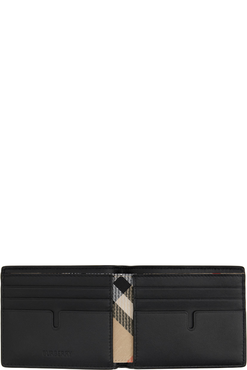 Pebble-grained calfskin bifold wallet. 

· Hand-painted edges 
· Logo hardware at face
· Six card slots at lambskin interior 
· Two patch pocket and one note slot 
· Signature check pattern printed at twill lining
· H3.25" x W4" x W0.5"

Supplier color: Black