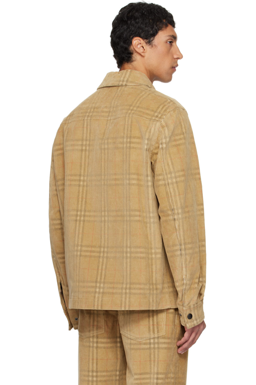 Cotton corduroy shirt. 

· Jacquard check pattern throughout 
· Spread collar 
· Press-stud closure
· Flap pocket at chest
· Pleats at buttoned barrel cuffs

Supplier color: Sand ip check