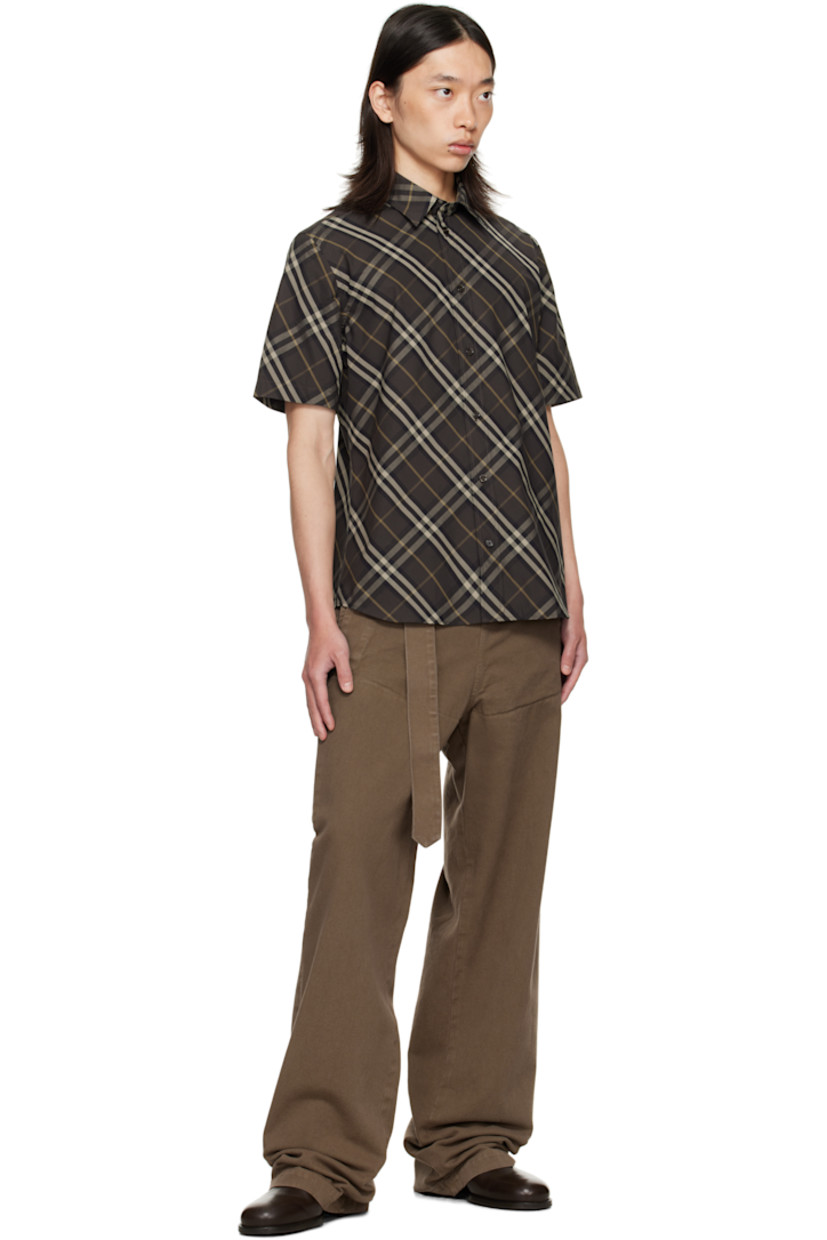 Cotton poplin shirt.

· Check pattern throughout
· Spread collar
· Button closure
· Shirttail hem 

Supplier color: Truffle brown