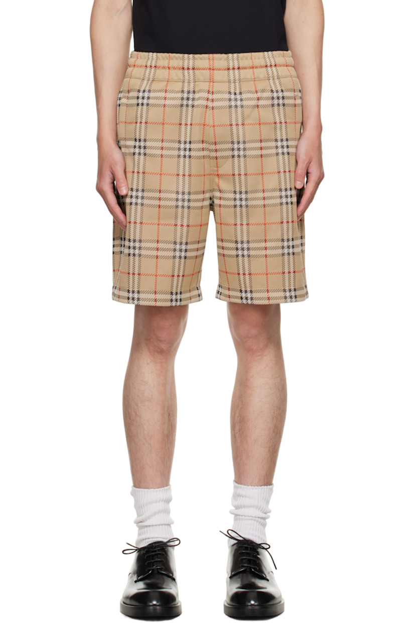 Recycled piqué shorts.

· Jacquard signature check pattern throughout 
· Concealed drawstring at elasticized waistband 
· Three-pocket styling

Supplier color: Sand IP check