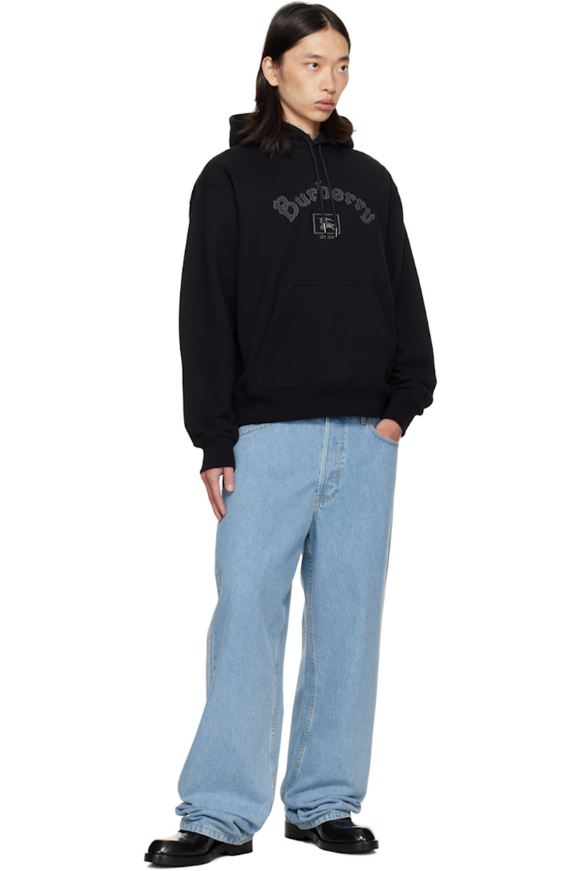 French terry hoodie.

· Drawstring at hood
· Logo and graphic embroidered at front
· Kangaroo pocket
· Rib-knit hem and cuffs
· Dropped shoulders

Supplier color: Black