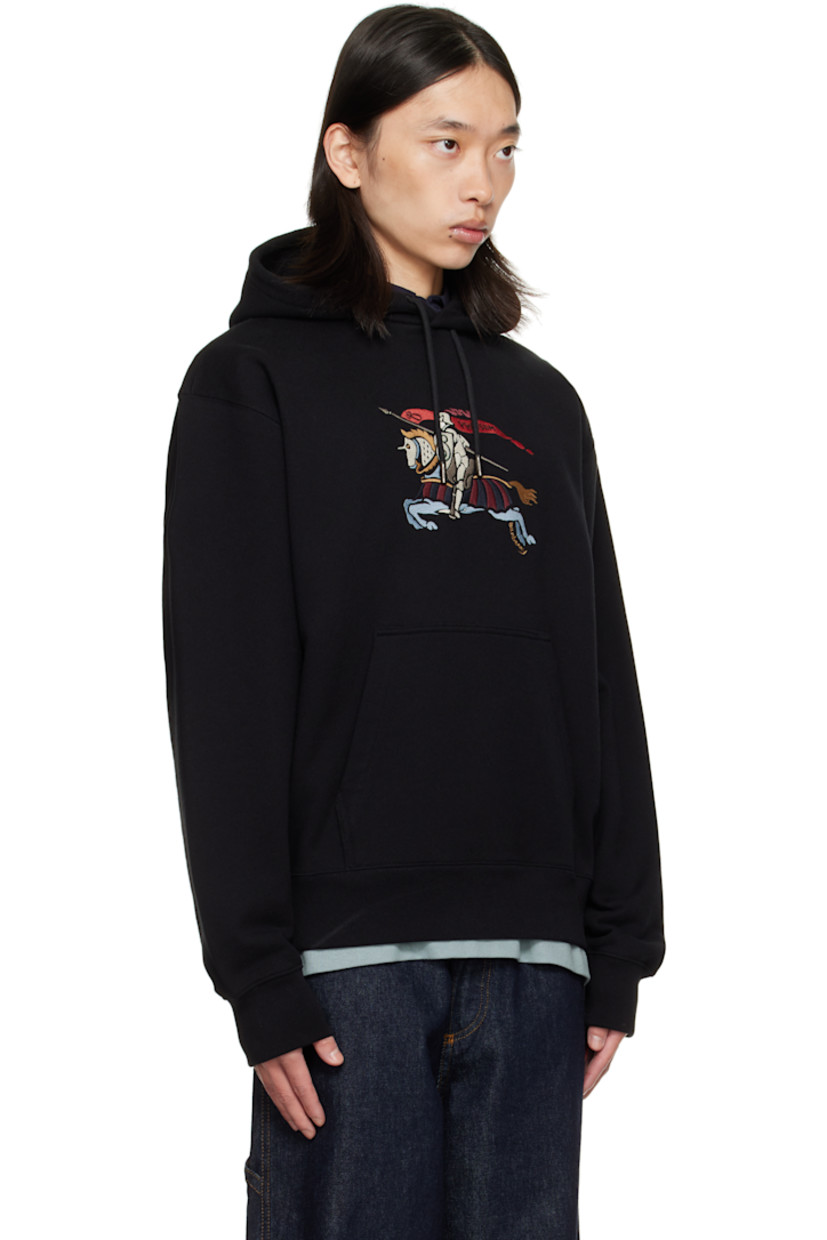 Heavyweight cotton terry hoodie.

· Drawstring at hood
· Embroidered logo at chest
· Kangaroo pocket at waist
· Rib-knit cuffs and hem

Supplier color: Black