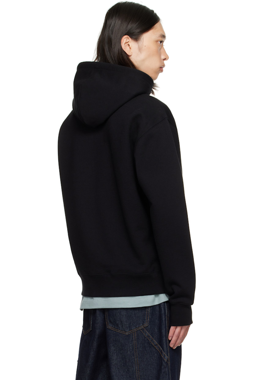 Heavyweight cotton terry hoodie.

· Drawstring at hood
· Embroidered logo at chest
· Kangaroo pocket at waist
· Rib-knit cuffs and hem

Supplier color: Black