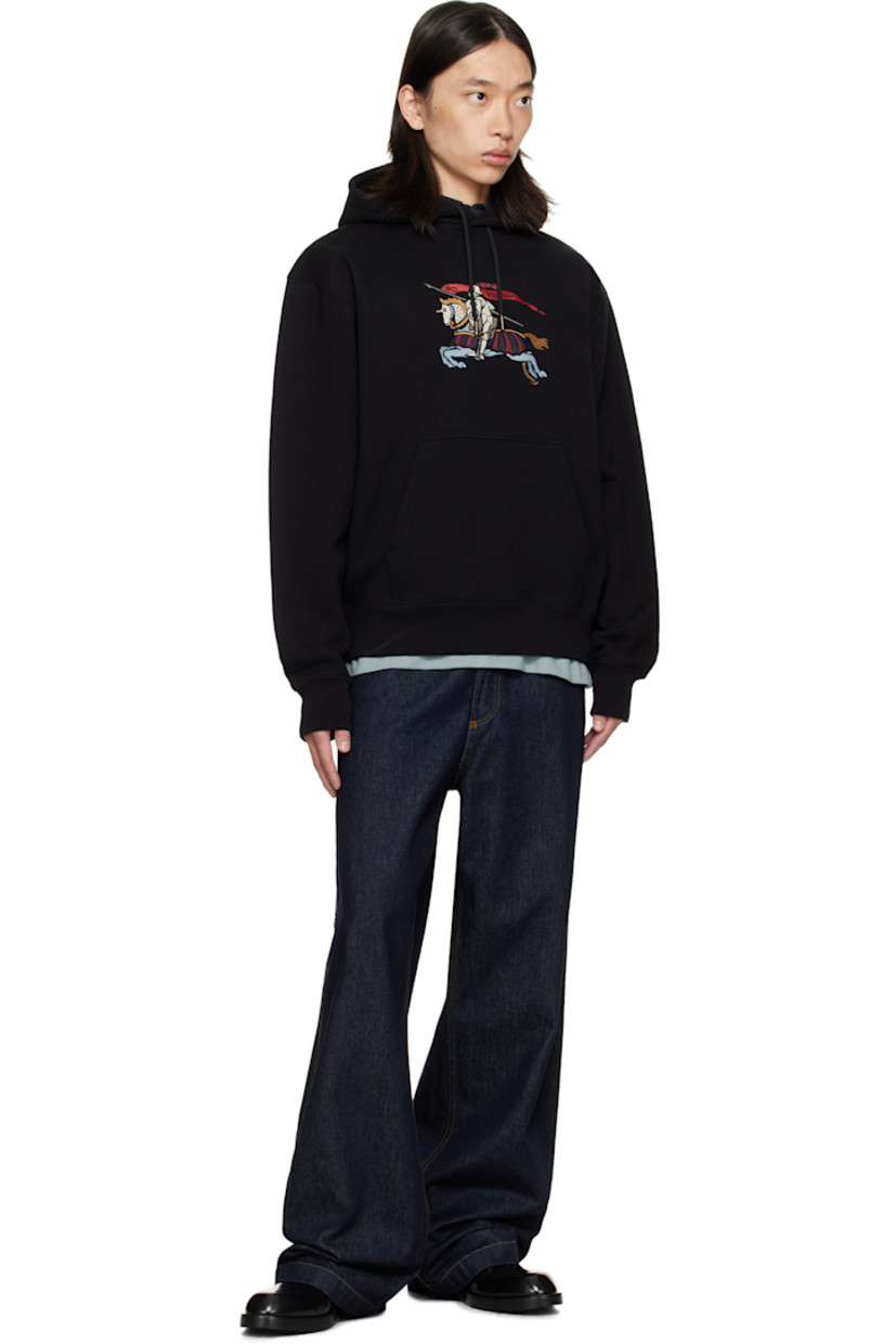 Heavyweight cotton terry hoodie.

· Drawstring at hood
· Embroidered logo at chest
· Kangaroo pocket at waist
· Rib-knit cuffs and hem

Supplier color: Black