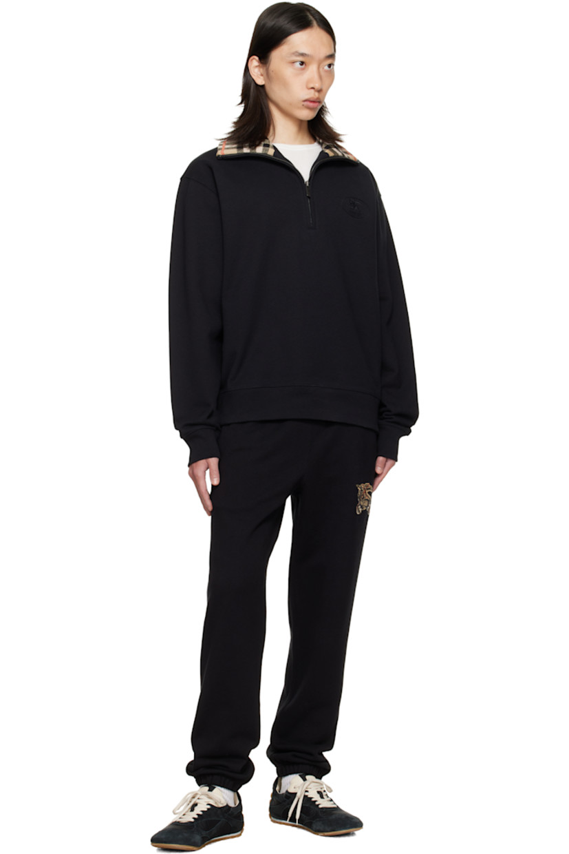 Heavyweight thermal cotton terry sweatshirt.

· Rib-knit stand collar with concealed check pattern
· Half-zip closure
· Embroidered logo at chest
· Rib-knit cuffs and hem

Supplier color: Black