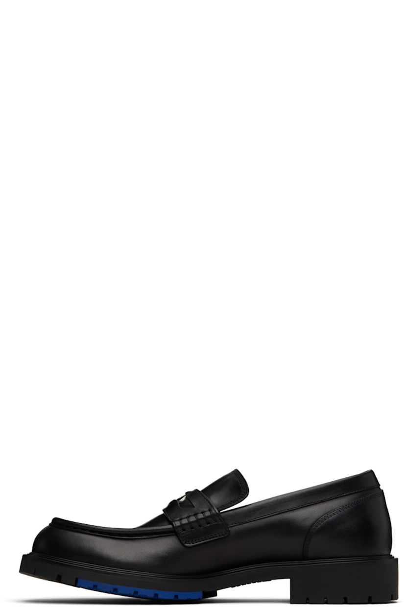 Buffed calfskin loafers.

· Moc toe 
· Strap with cutout and inset logo hardware at vamp
· Logo embossed at outer side
· Treaded rubber sole 

Supplier color: Black