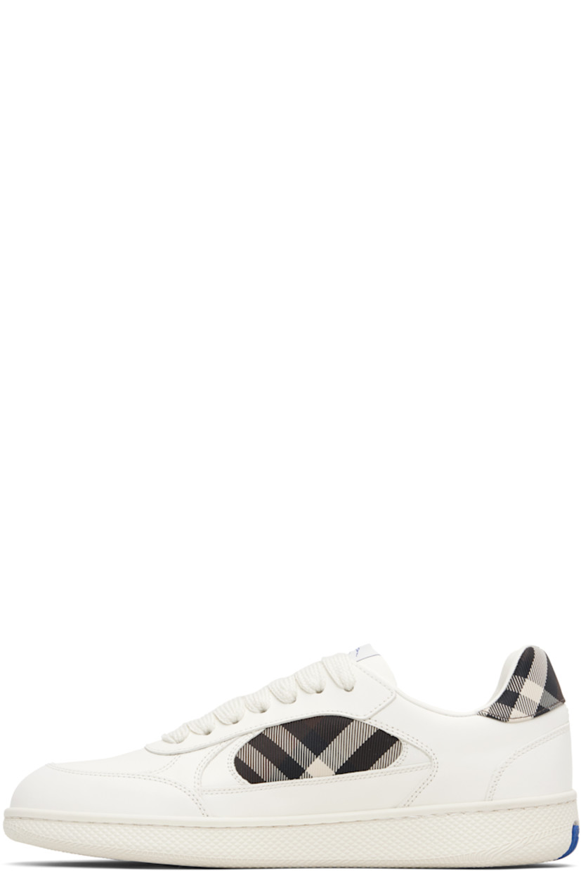 Low-top buffed calfskin and twill sneakers.

· Signature check pattern throughout 
· Lace-up closure
· Logo patch at padded tongue 
· Padded collar 
· Textured rubber midsole 
· Treaded rubber sole

Supplier color: Cotton/Mahogany ip check
