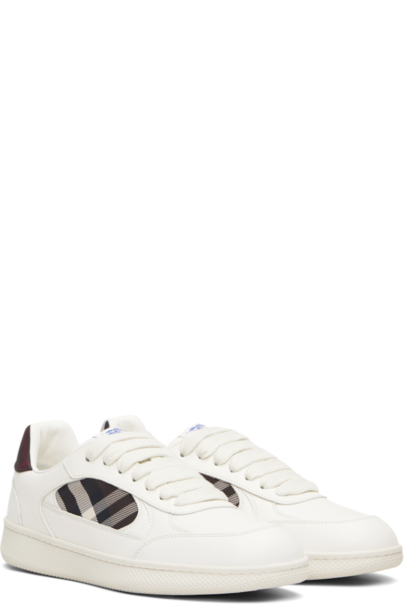 Low-top buffed calfskin and twill sneakers.

· Signature check pattern throughout 
· Lace-up closure
· Logo patch at padded tongue 
· Padded collar 
· Textured rubber midsole 
· Treaded rubber sole

Supplier color: Cotton/Mahogany ip check