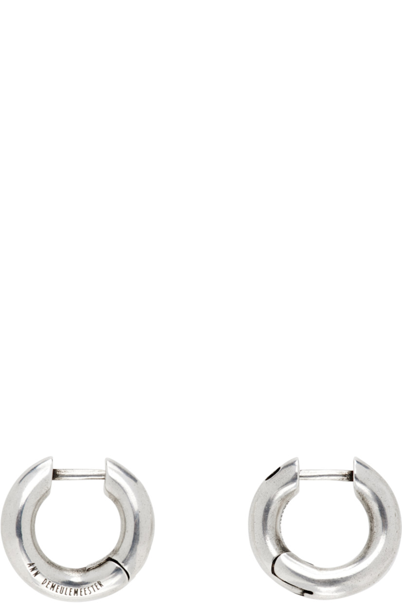 Pair of hoop earrings in sterling silver. 

· Logo engraved at side 
· Post-stud fastening 
· D0.5"

Supplier color: Antique silver