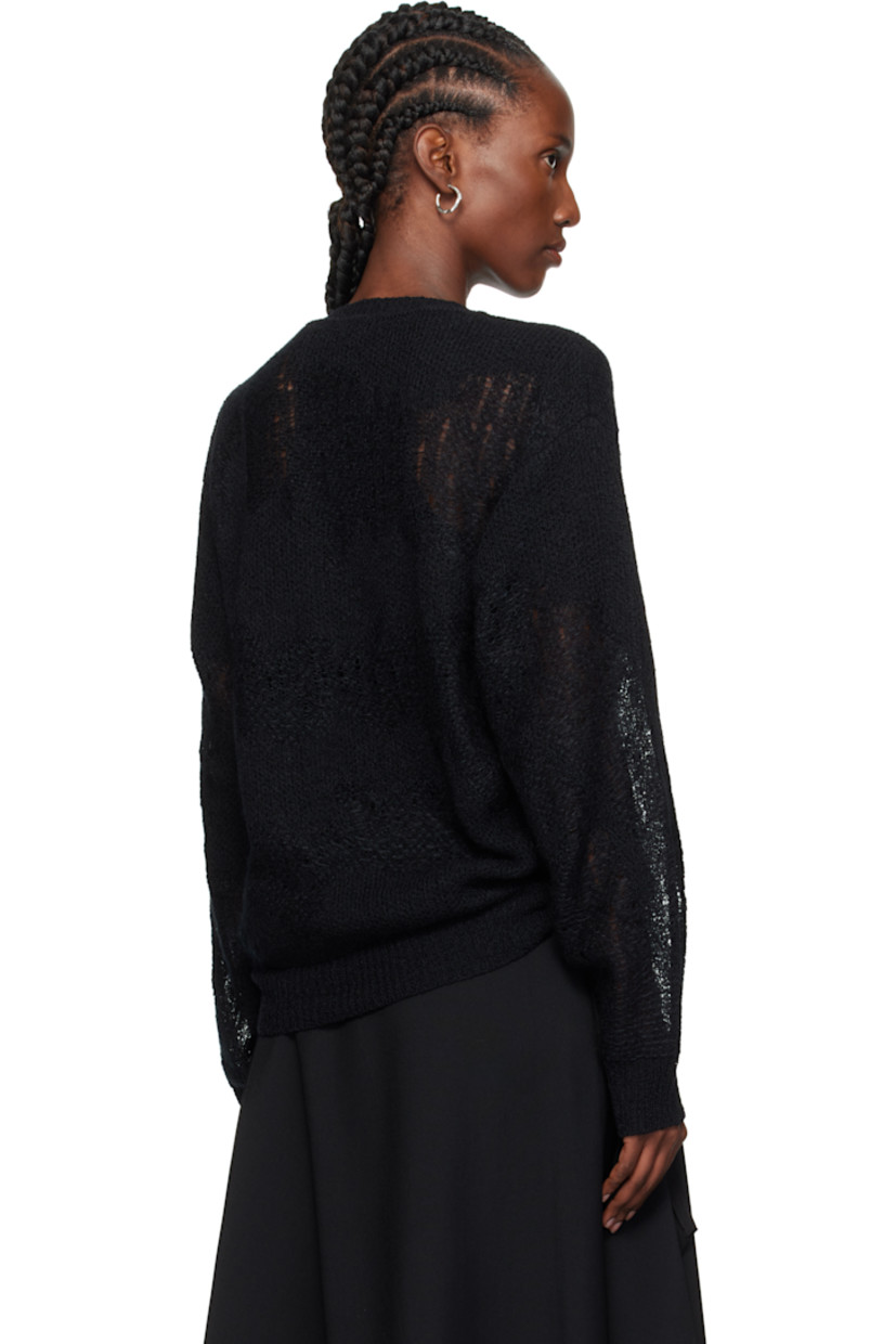 Open-knit brushed mohair- and silk- blend sweater. 

· Semi-sheer
· Jacquard pattern throughout
· Rib-knit crewneck, hem, and cuffs
· Dropped shoulders 

Supplier color: Black